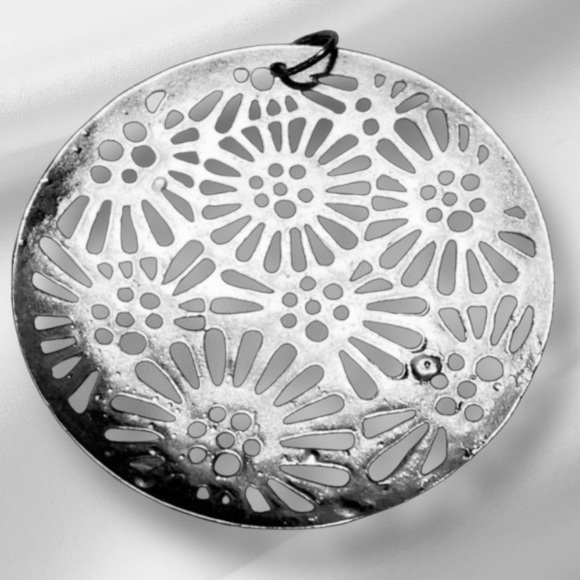 Silver Tone Large Round Pendant Featuring a Flower Cutout Design (no necklace) - Picture 2 of 3